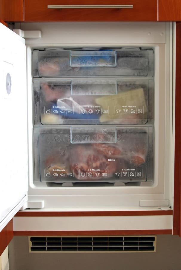 Opened freezer in a kitchen. Opened freezer in a kitchen