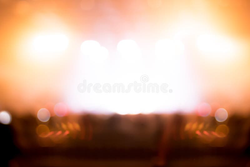 Blurred background : Bokeh lighting in concert with audience ,Music showbiz concept. Blurred background : Bokeh lighting in concert with audience ,Music showbiz concept.