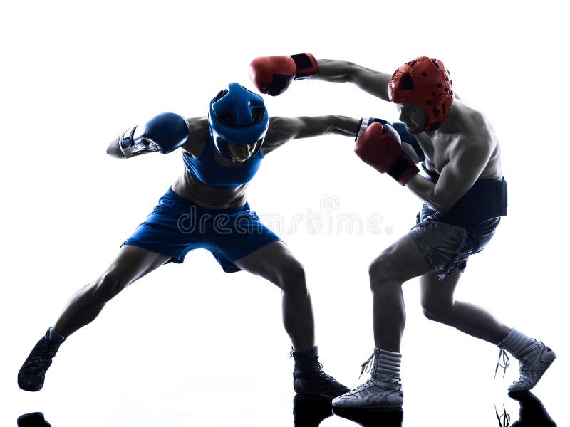 被隔绝的妇女拳击手拳击人kickboxing的剪影 图库摄影