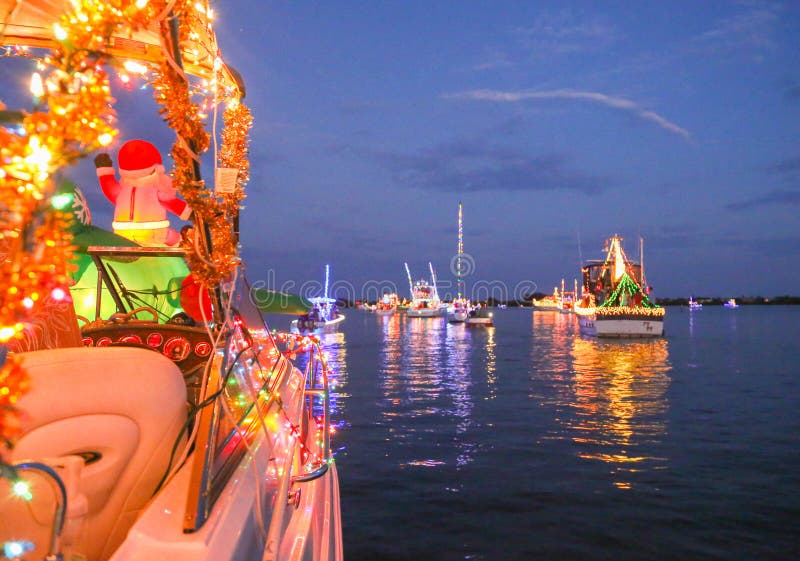 Festive decorated boats line up for a winter-time boat parade on Florida`s waterways. Festive decorated boats line up for a winter-time boat parade on Florida`s waterways.