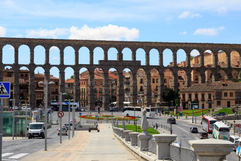 The Aqueduct of Segovia or the aqueduct bridge is a Roman aqueduct and one of the best-preserved elevated Roman aqueducts and the foremost symbol of Segovia, as evidenced by its presence on the city`s coat of arms. It was thought to have been built during the 1st century AD, during the reigns of the Emperors Domitian, Nerva, and Trajan. The aqueduct is built of unmortared, brick-like granite blocks and once transported water from the Rio Frio river, situated in mountains 17 km 11 mi from the city in the La Acebeda region. The Aqueduct of Segovia or the aqueduct bridge is a Roman aqueduct and one of the best-preserved elevated Roman aqueducts and the foremost symbol of Segovia, as evidenced by its presence on the city`s coat of arms. It was thought to have been built during the 1st century AD, during the reigns of the Emperors Domitian, Nerva, and Trajan. The aqueduct is built of unmortared, brick-like granite blocks and once transported water from the Rio Frio river, situated in mountains 17 km 11 mi from the city in the La Acebeda region.