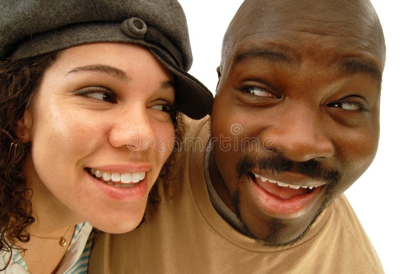 Distorted, fun portrait of two casual young people looking at each other and laughing; isolated on white. Distorted, fun portrait of two casual young people looking at each other and laughing; isolated on white