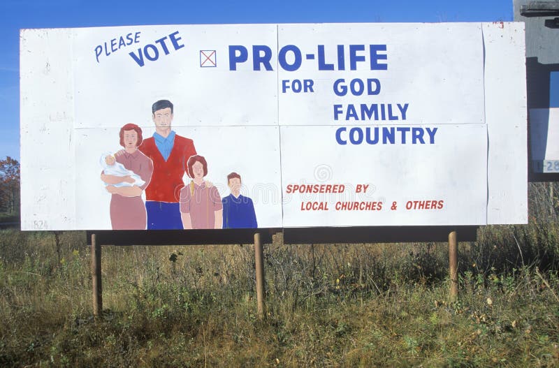 A sign that reads ï¿½Please vote pro-lifeï¿½. A sign that reads ï¿½Please vote pro-lifeï¿½