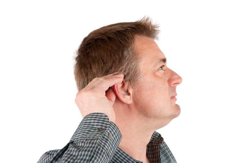 Man adjusting his hearing aid. Isolated on white. Man adjusting his hearing aid. Isolated on white.