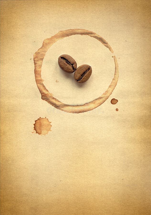 Spot on the cup and coffee beans on paper. Spot on the cup and coffee beans on paper