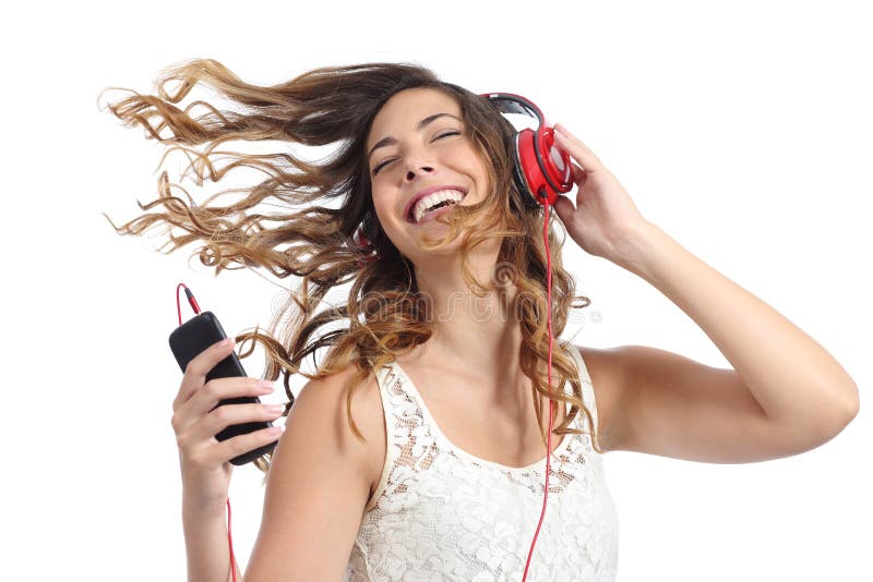 Happy girl dancing and listening to the music isolated on a white background. Happy girl dancing and listening to the music isolated on a white background