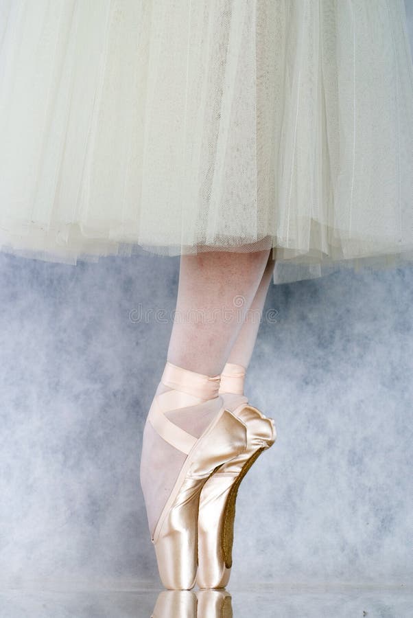 Dancer in ballet pointe isolated. Dancer in ballet pointe isolated