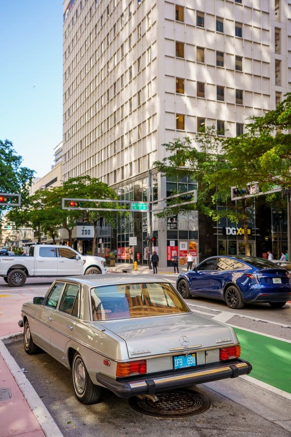 Miami, FL, USA - February 21, 2024: Old Mercedes 300D Diesel car on the streets of Downtown Miami. Miami, FL, USA - February 21, 2024: Old Mercedes 300D Diesel car on the streets of Downtown Miami