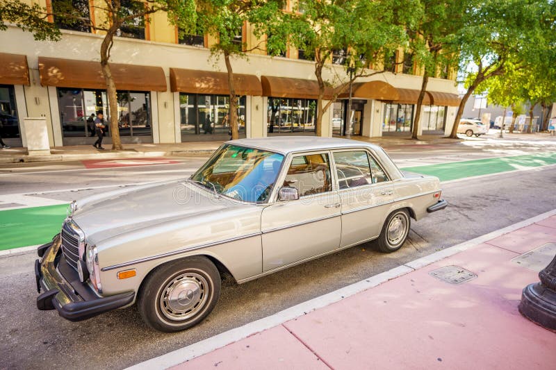 Miami, FL, USA - February 21, 2024: Old Mercedes 300D Diesel car on the streets of Downtown Miami. Miami, FL, USA - February 21, 2024: Old Mercedes 300D Diesel car on the streets of Downtown Miami