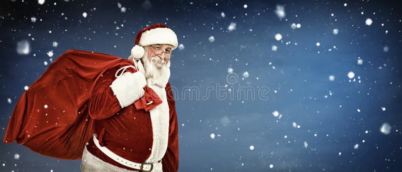 Santa Claus carrying a bag full of gifts, on copyspace background. Santa Claus carrying a bag full of gifts, on copyspace background