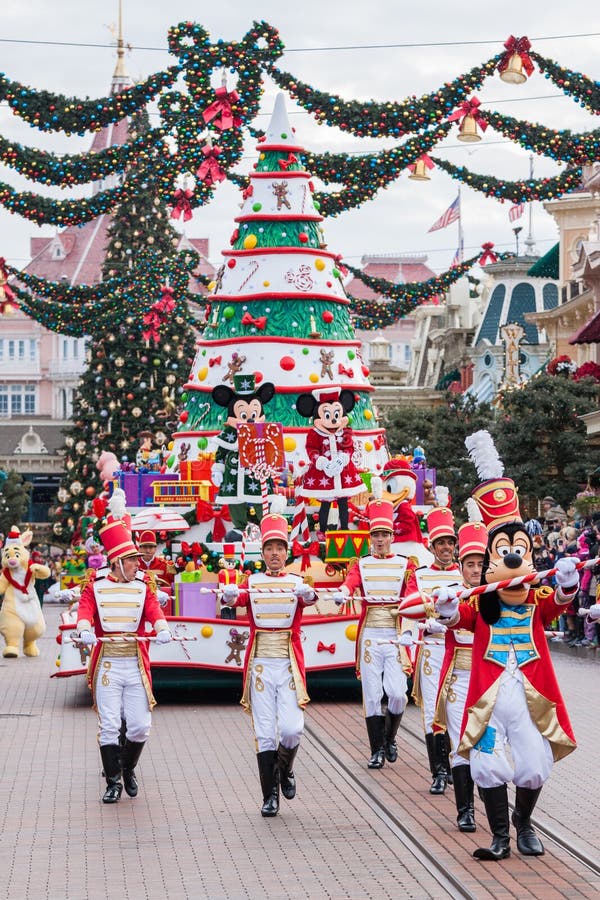 PARIS â€“ December 31, 2013 â€“ Disney Christmas Parade in Disneyland Paris. PARIS â€“ December 31, 2013 â€“ Disney Christmas Parade in Disneyland Paris.