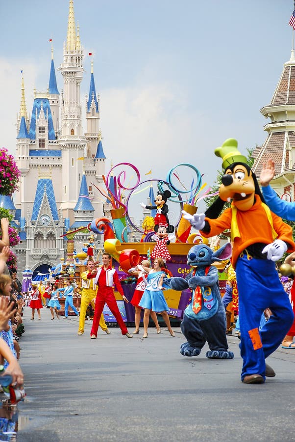 Mickey Mouse, Pluto, Stitch in afternoon Parade near Cinderellaâ€™s castle at Walt Disney World. Mickey Mouse, Pluto, Stitch in afternoon Parade near Cinderellaâ€™s castle at Walt Disney World.