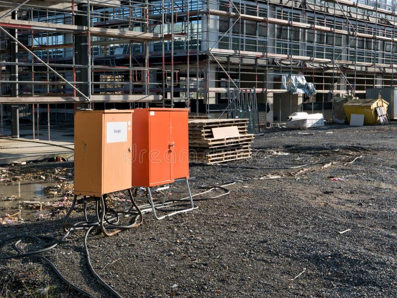 Orange distribution boards at construction site. Orange distribution boards at construction site