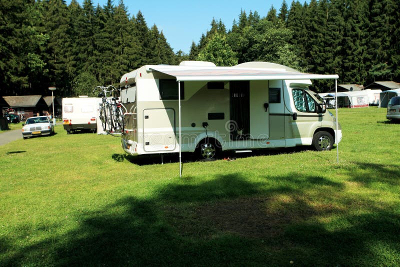 Camping car based at a camping area. Camping car based at a camping area.