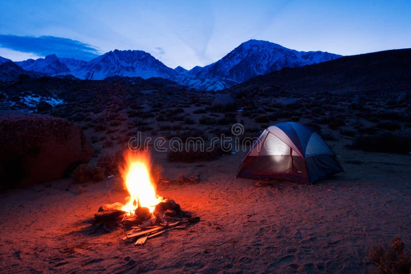 Camping in the Mountains, Campfire at Sunset. Camping in the Mountains, Campfire at Sunset