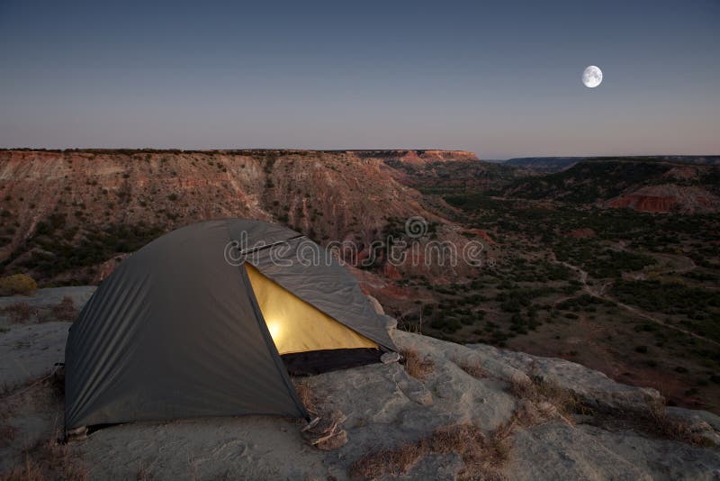 Camping at the Canyon, with light in tent. Camping at the Canyon, with light in tent.