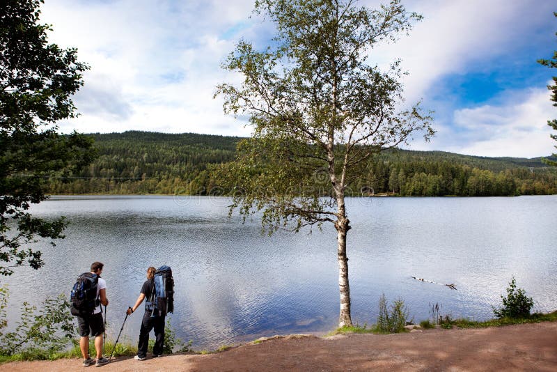 Walking and resting on a camping trip by a lake. Walking and resting on a camping trip by a lake