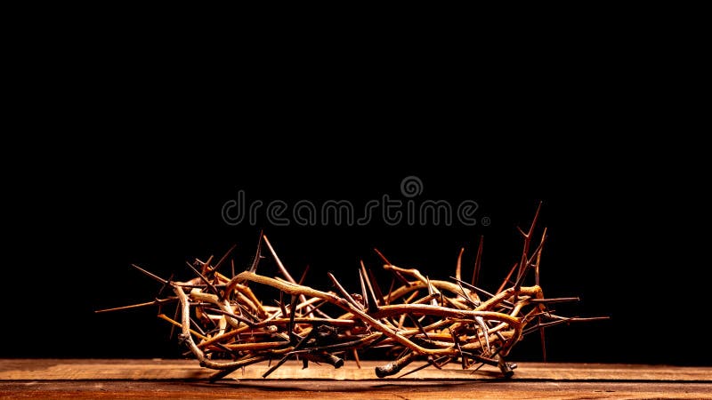 An authentic crown of thorns on a wooden background. Easter Theme. An authentic crown of thorns on a wooden background. Easter Theme