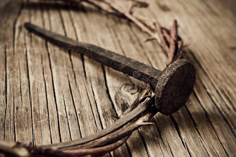 A depiction of the crown of thorns of Jesus Christ and a nail, on the Holy Cross. A depiction of the crown of thorns of Jesus Christ and a nail, on the Holy Cross