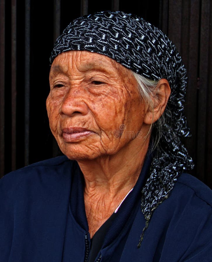 年长妇女画象在PADANG城市印度尼西亚 免版税图库摄影 年长妇女画象在PADANG城市印度尼西亚 免版税图库摄影