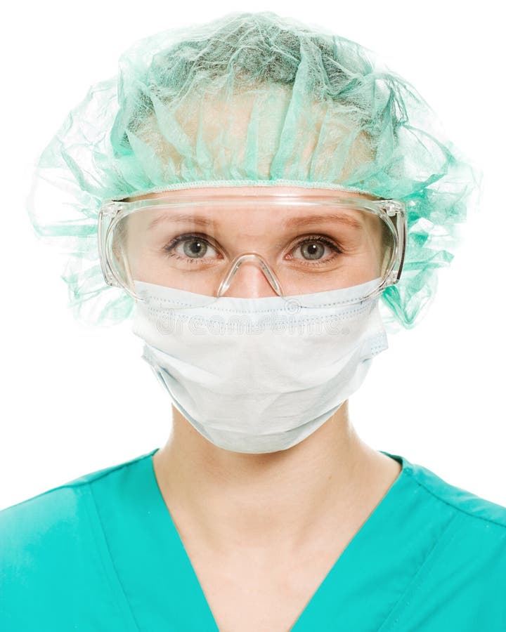 防护玻璃和屏蔽的外科医生妇女