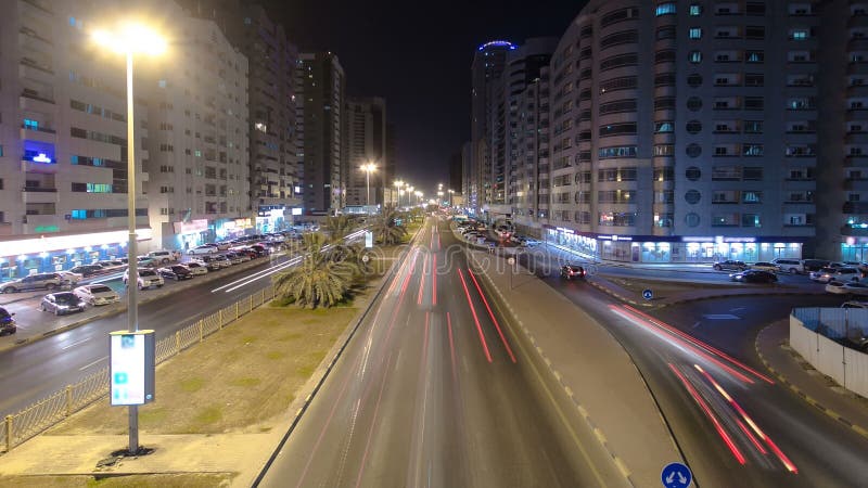 阿吉曼都市风景从桥梁的在夜timelapse 阿吉曼是阿吉曼酋长管辖区的资本在阿联酋 图库摄影 阿吉曼都市风景从桥梁的在夜timelapse 阿吉曼是阿吉曼酋长管辖区的资本在阿联酋 图库摄影