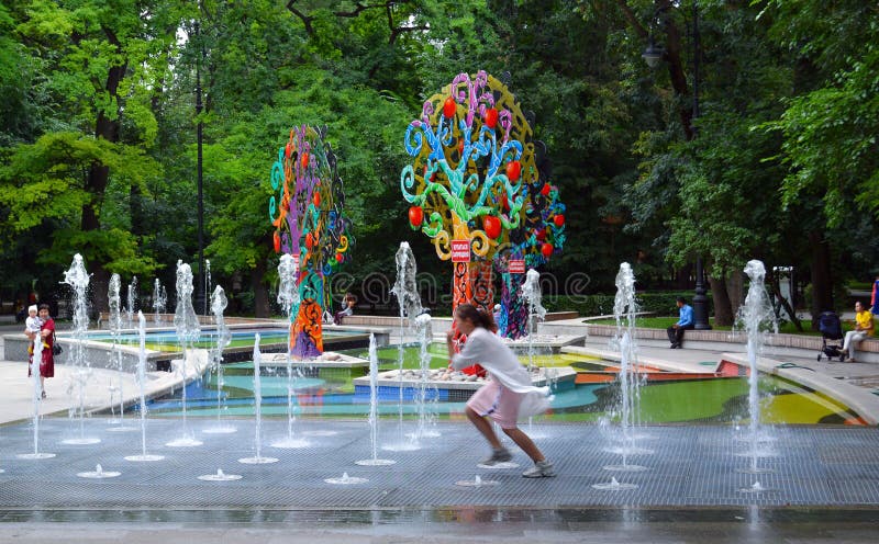 Almaty, Kazakhstan - 17.06.2020: Gorky Park. people in the center of Almaty. Early spring time, people walk. Almaty, Kazakhstan - 17.06.2020: Gorky Park. people in the center of Almaty. Early spring time, people walk.