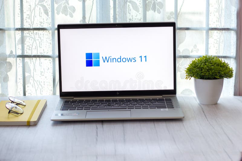 Assam, india - June 17, 2021 : Windows 11 logo on laptop screen stock image. Assam, india - June 17, 2021 : Windows 11 logo on laptop screen stock image.