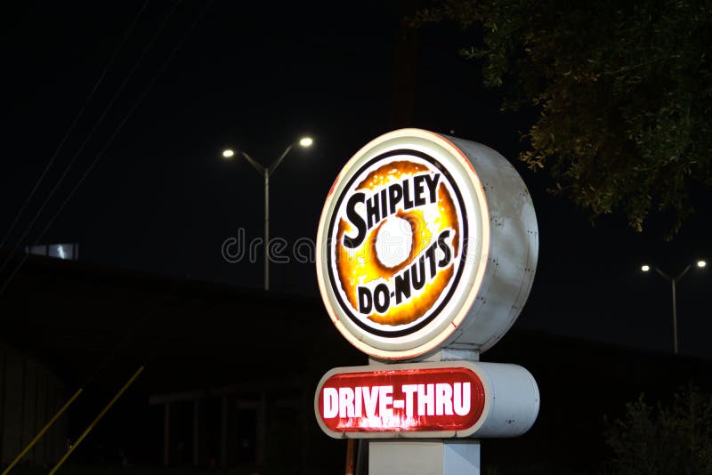 Humble, Texas/USA 09/29/2019: Neon Shipley Do-Nuts sign on Old Humble Rd in Humble, TX. Shipley Do-Nuts are iconic in the Southern US. Founded in Houston 1936 they are a household name in the South. Humble, Texas/USA 09/29/2019: Neon Shipley Do-Nuts sign on Old Humble Rd in Humble, TX. Shipley Do-Nuts are iconic in the Southern US. Founded in Houston 1936 they are a household name in the South.