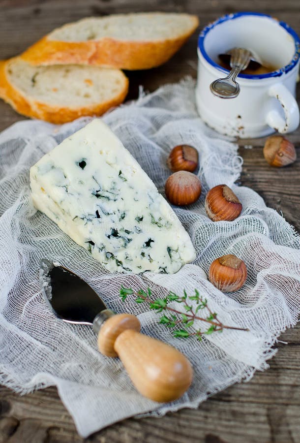 Blue cheese with nuts and bread. Blue cheese with nuts and bread