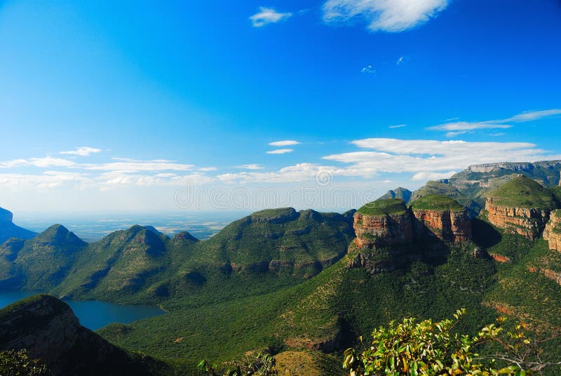 The Blyde River Canyon is a significant natural feature of South Africa. It is approximately 26 kilometers in length and is, on average, around 800m deep. The Blyde River Canyon is a significant natural feature of South Africa. It is approximately 26 kilometers in length and is, on average, around 800m deep.