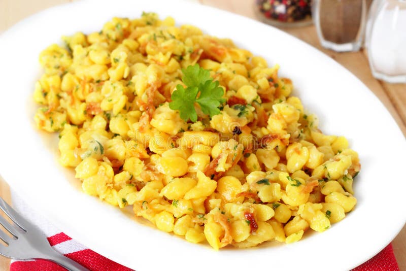 Spaetzle - noodles with grated cheese. Spaetzle - noodles with grated cheese