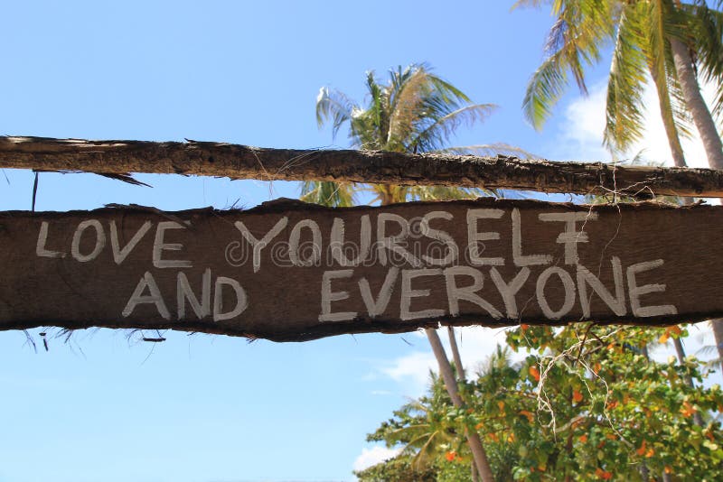 Travel to island Koh Lanta, Thailand. An inscription â€œLove yourself and everyoneâ€ on the wooden abandoned hut. Travel to island Koh Lanta, Thailand. An inscription â€œLove yourself and everyoneâ€ on the wooden abandoned hut.