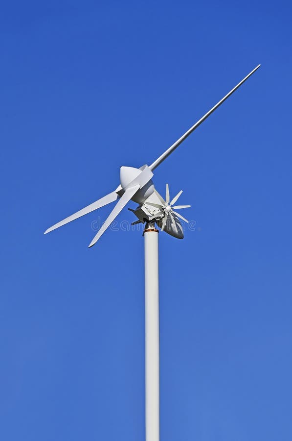 Wind power turbine on blue sky background. Wind power turbine on blue sky background