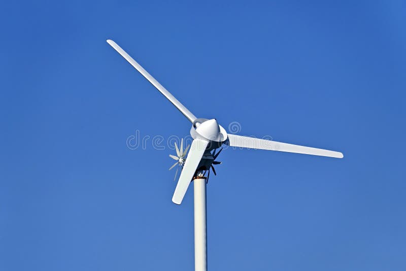 Wind power turbine on blue sky background. Wind power turbine on blue sky background