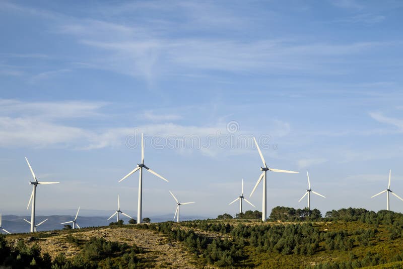 Wind turbines farm generating clean renewable energy. Wind turbines farm generating clean renewable energy