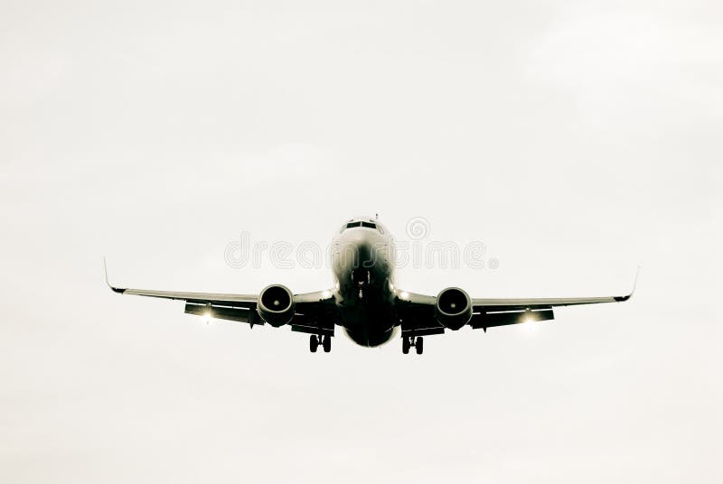 Airplane landing at sun set. Airplane landing at sun set