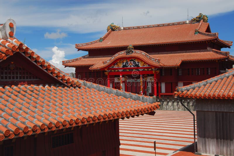 Buildings around the main square at Shuri Castle, Naha, Okinawa, Japan. The large building in the back is the seiden or main hall. Buildings around the main square at Shuri Castle, Naha, Okinawa, Japan. The large building in the back is the seiden or main hall.
