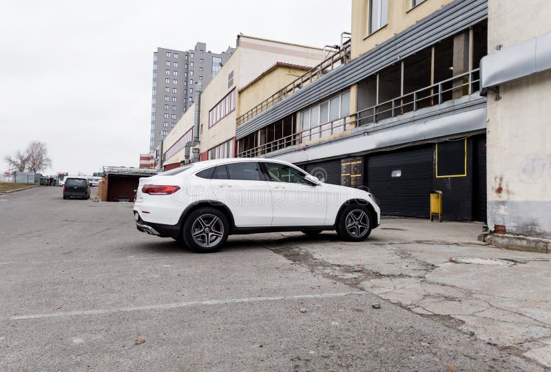 Minsk, Belarus, March 11, 2024 - premium white mercedes-benz gls 300d 4matic of luxury vehicles produced by the German automaker parked on the road. Minsk, Belarus, March 11, 2024 - premium white mercedes-benz gls 300d 4matic of luxury vehicles produced by the German automaker parked on the road