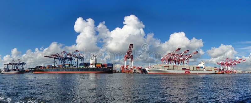 KAOHSIUNG, TAIWAN -- JUNE 2, 2019: Containers are being loaded onto ships in Kaohsiung Port. KAOHSIUNG, TAIWAN -- JUNE 2, 2019: Containers are being loaded onto ships in Kaohsiung Port