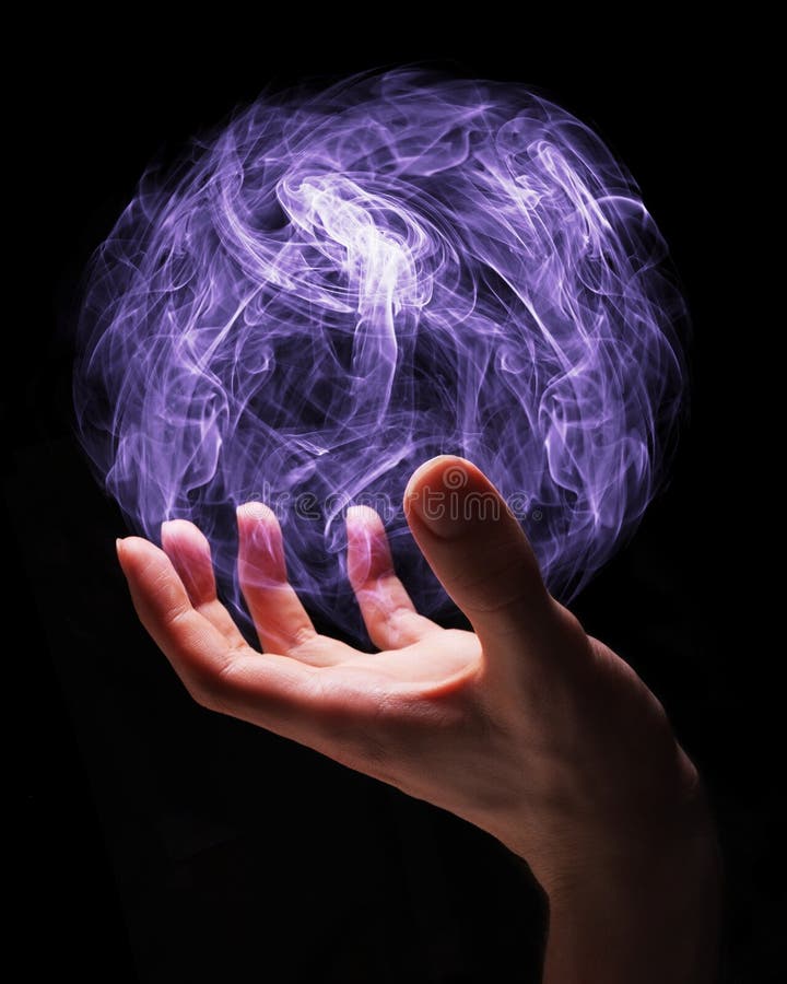 Hand of a young wizard creating a magical sphere. Hand of a young wizard creating a magical sphere.