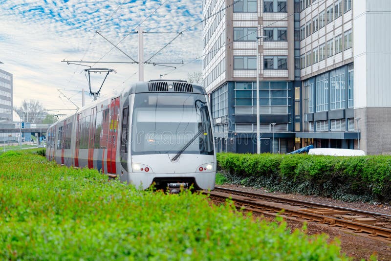 Uncover Rotterdam&#x27;s electrified urban transport system featuring a network of public trams, providing reliable and environmentally conscious travel options in the city. Uncover Rotterdam&#x27;s electrified urban transport system featuring a network of public trams, providing reliable and environmentally conscious travel options in the city.