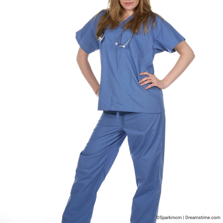 Pretty woman in blue medical scrubs