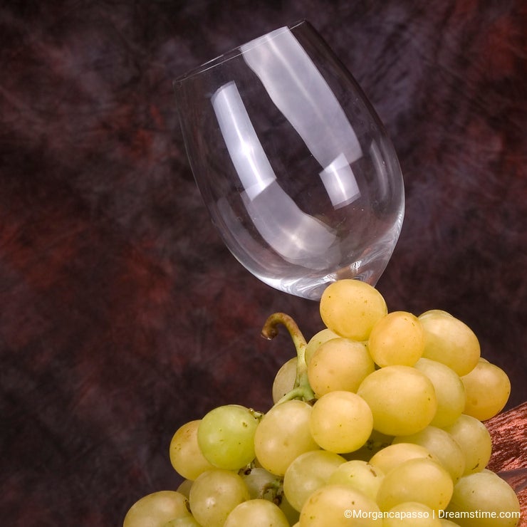 Wine glass and grapes