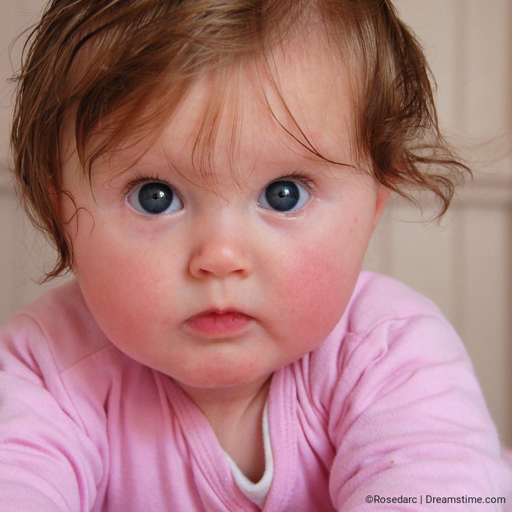Cute blue eyed baby girl