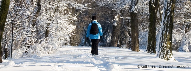 A woman walking in the snow