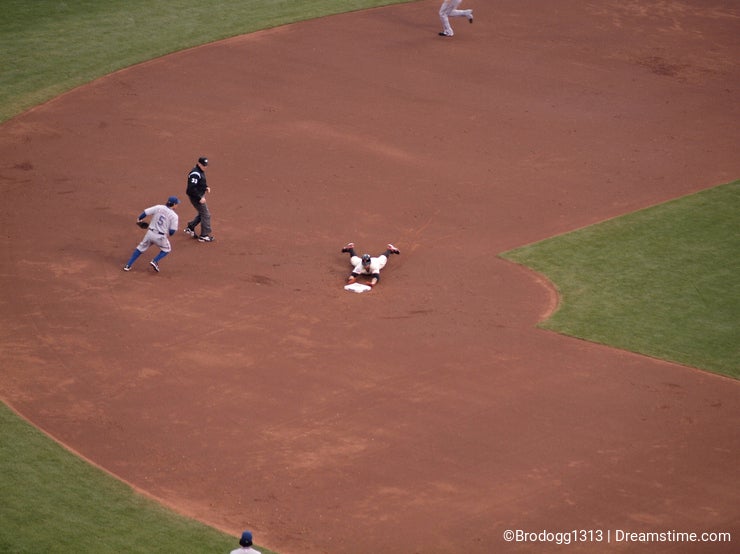 Cody Ross slides into second hands first