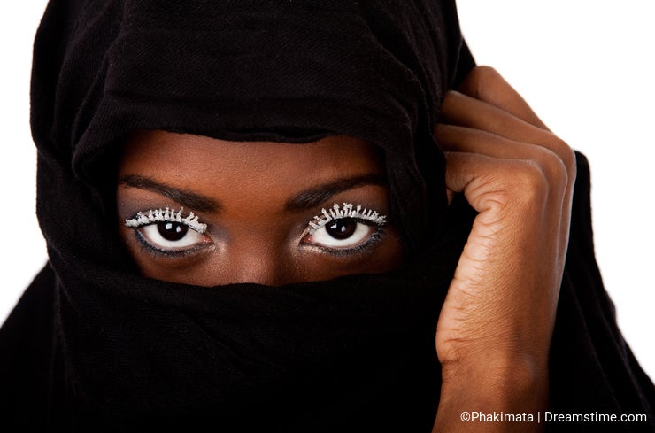 Female face in black scarf