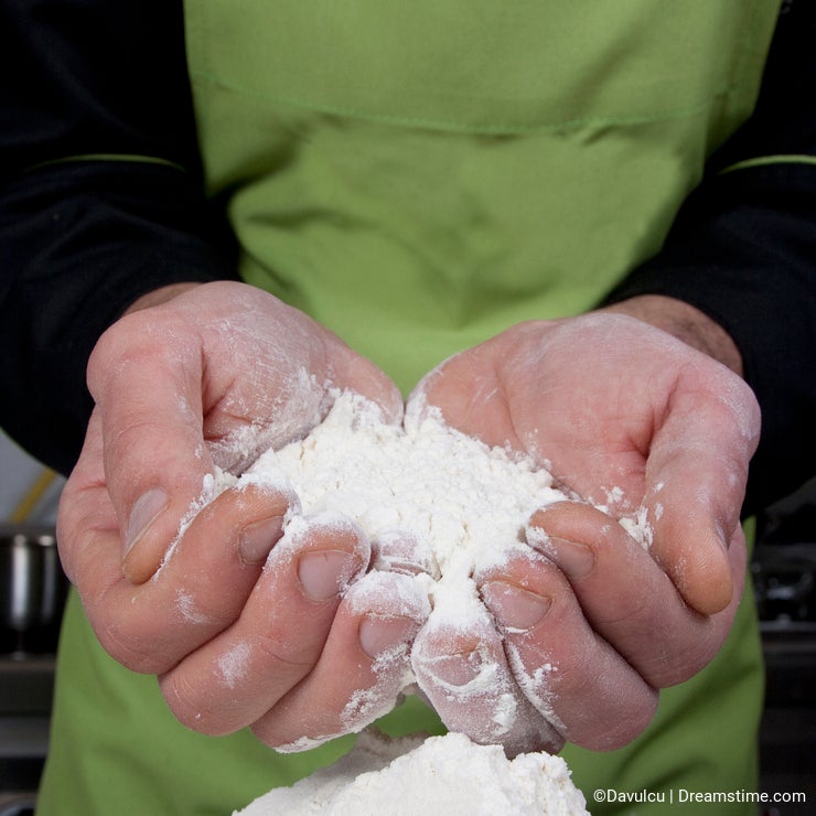 Baker with flour