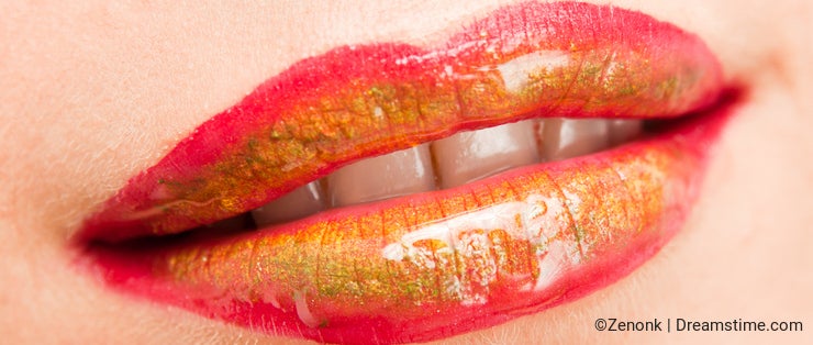 Lips with red, green and yellow lipstick